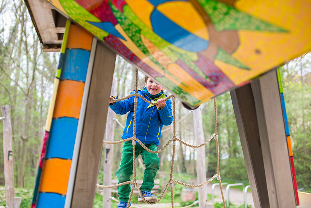 09_boy-climbing-on-playground