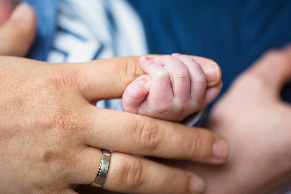 close-up of baby hand newborn