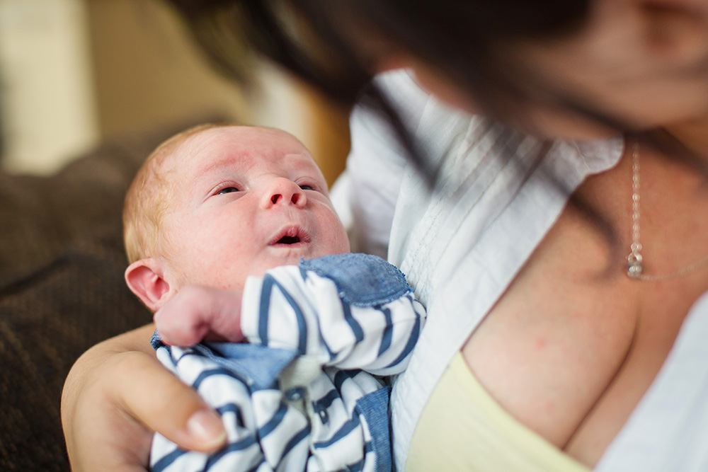 baby boy in mommas arms