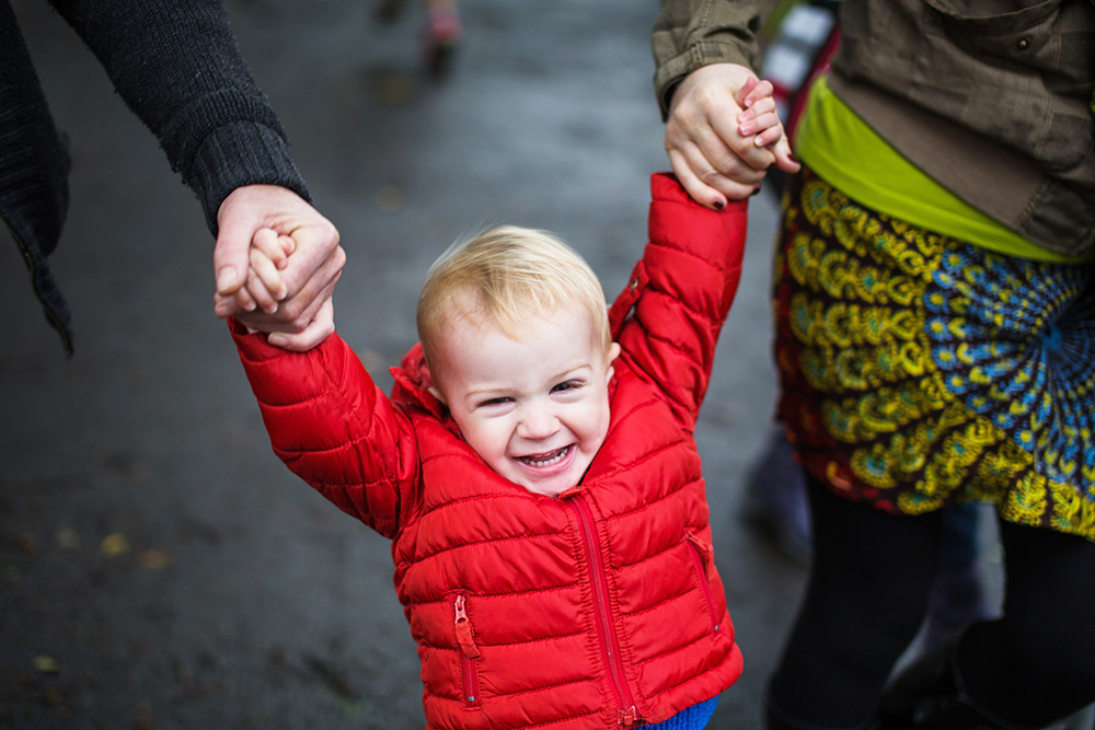 01 toddler swinging happy