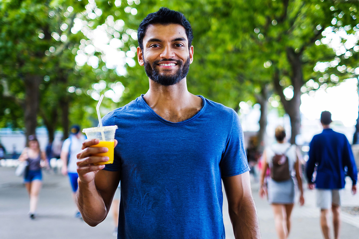 07_guy with juice_portrait_happy_street