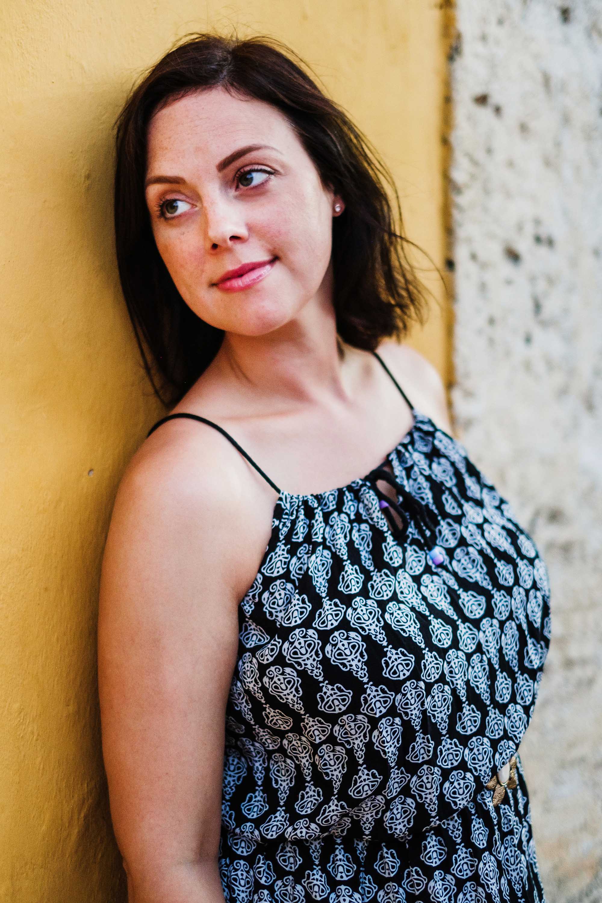 Portraits in Colombia, photographer, yellow wall, Cartagena