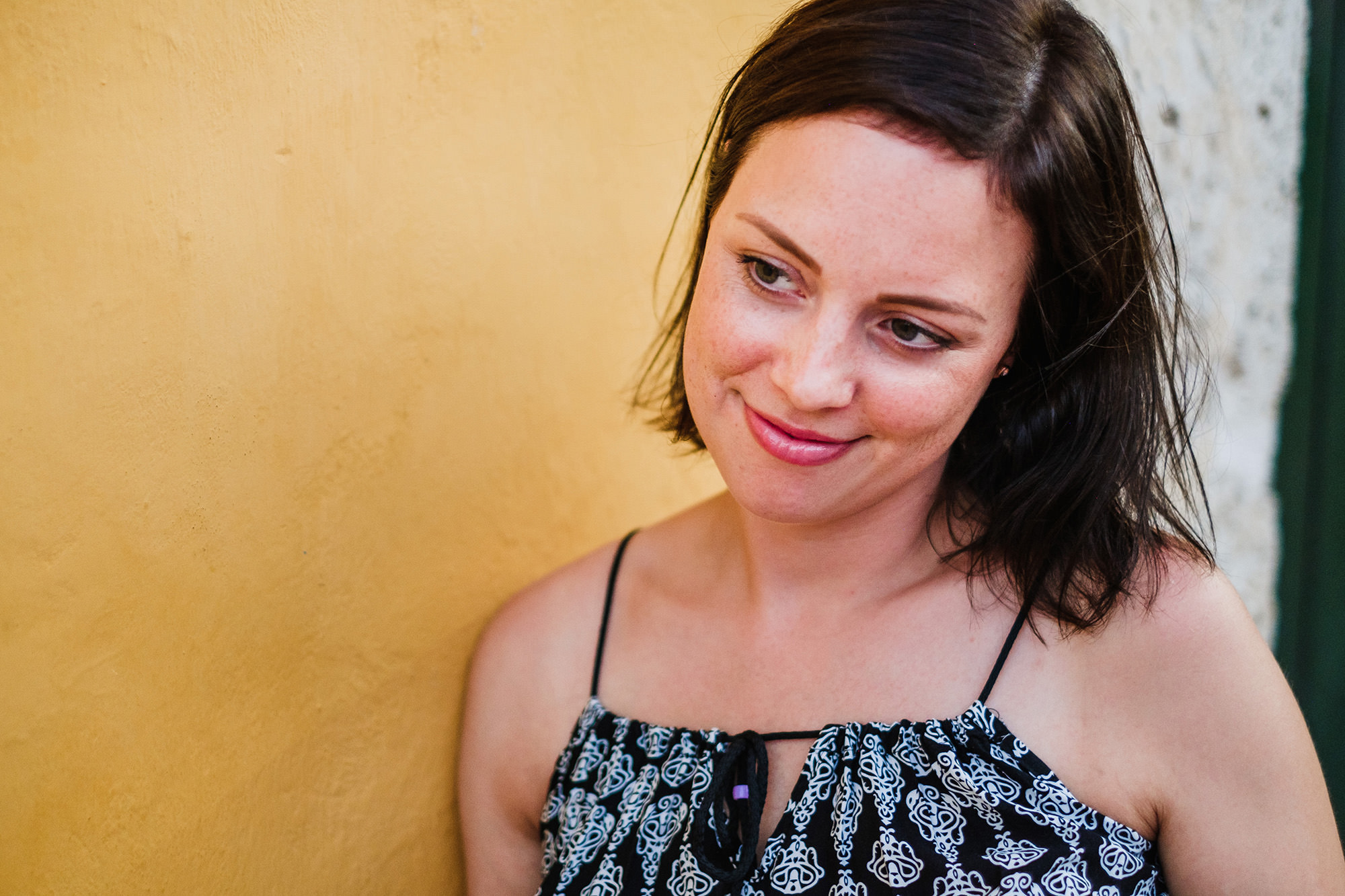 Portraits in Colombia, photographer, yellow wall, Cartagena