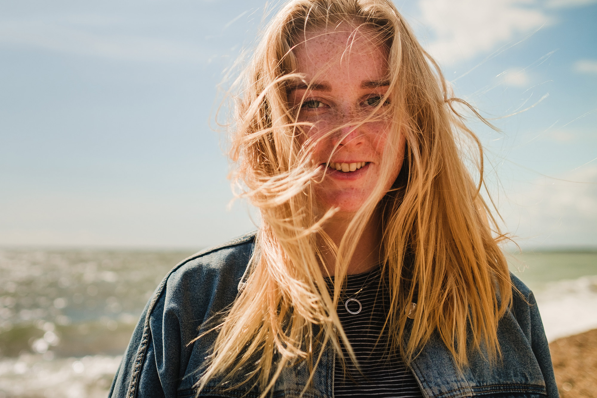 beach hair wild windy woman