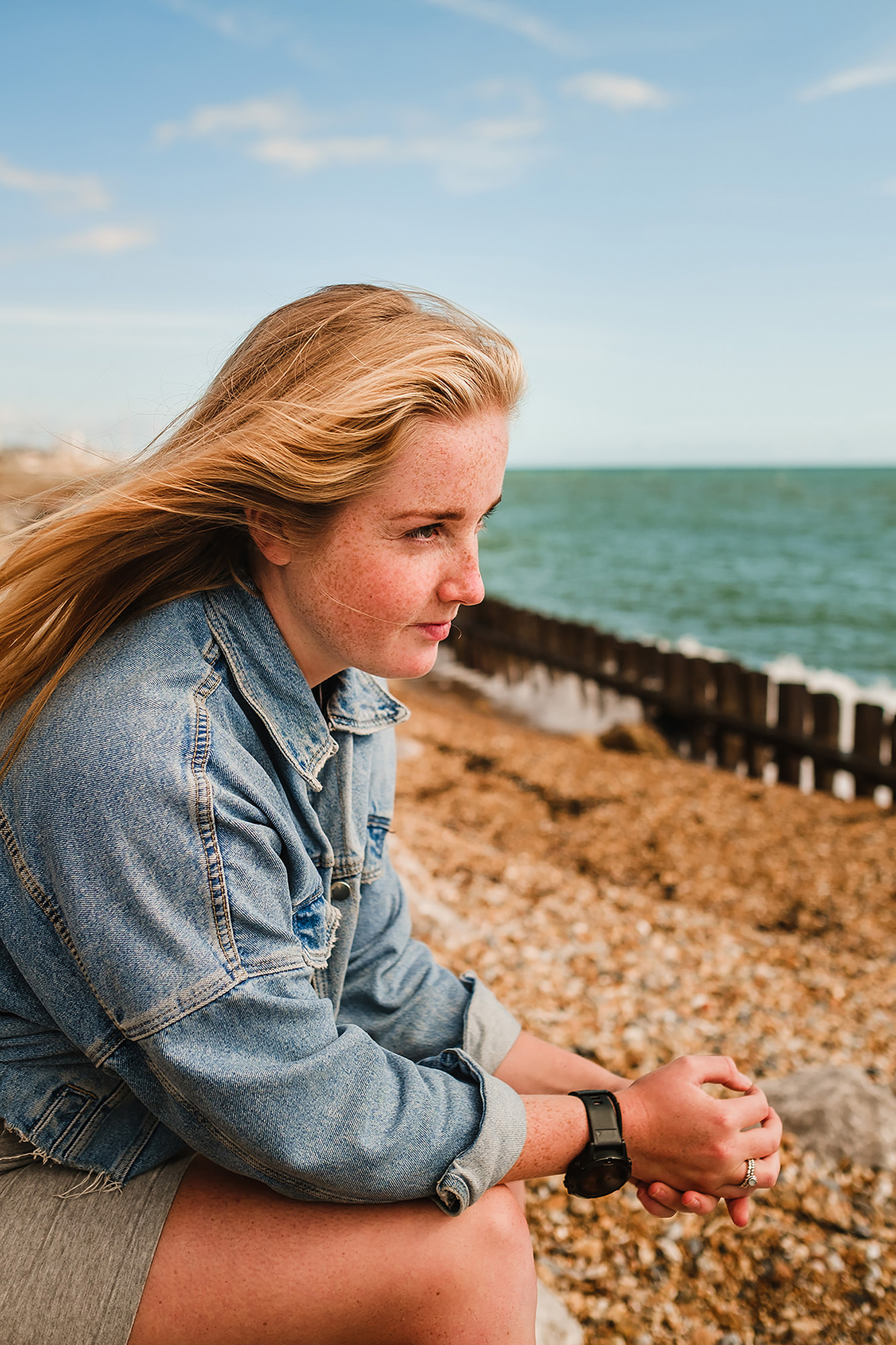 long portrait of a woman at the beach