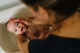 baby boy getting a bath