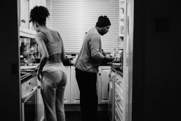 documentary family photography in worthing dad and daughter cooking