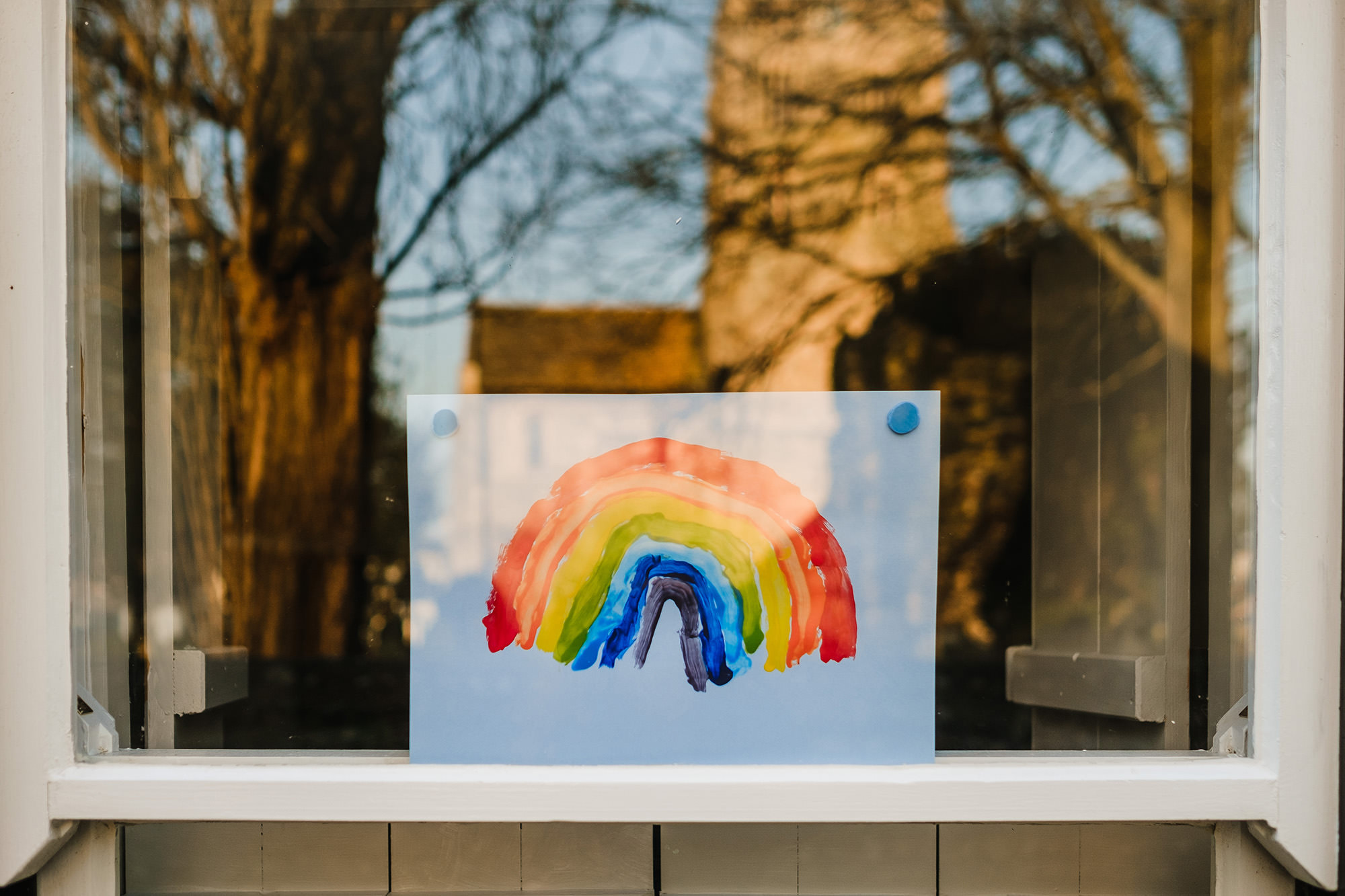 rainbow picture in window social distancing