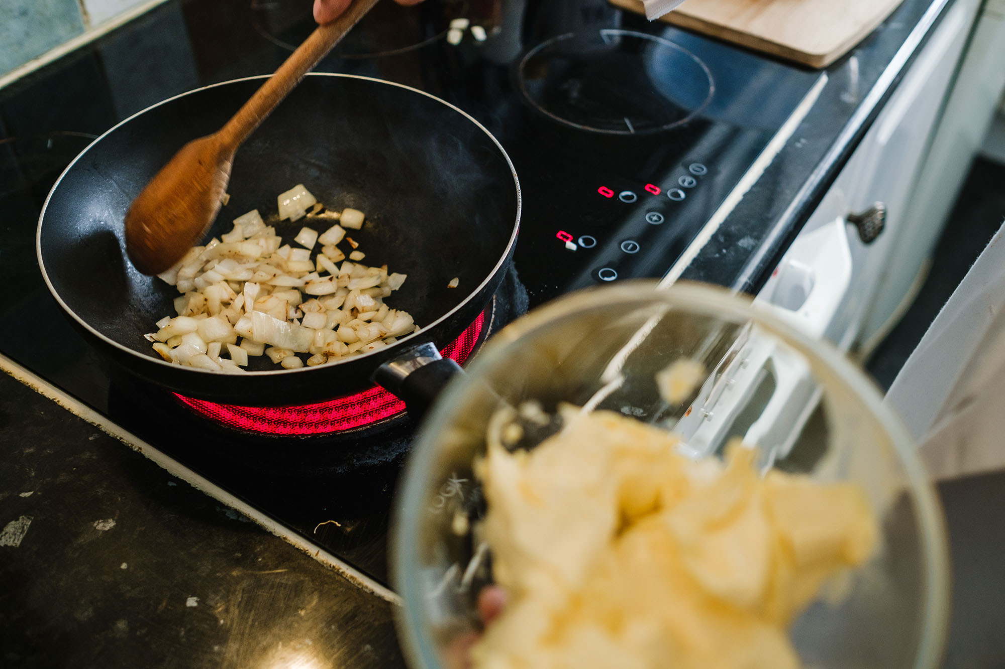 frying onions for facebook live cooking show