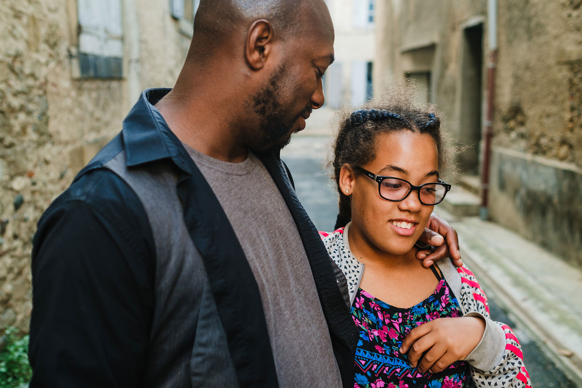 dad looking at youngest daughter with love