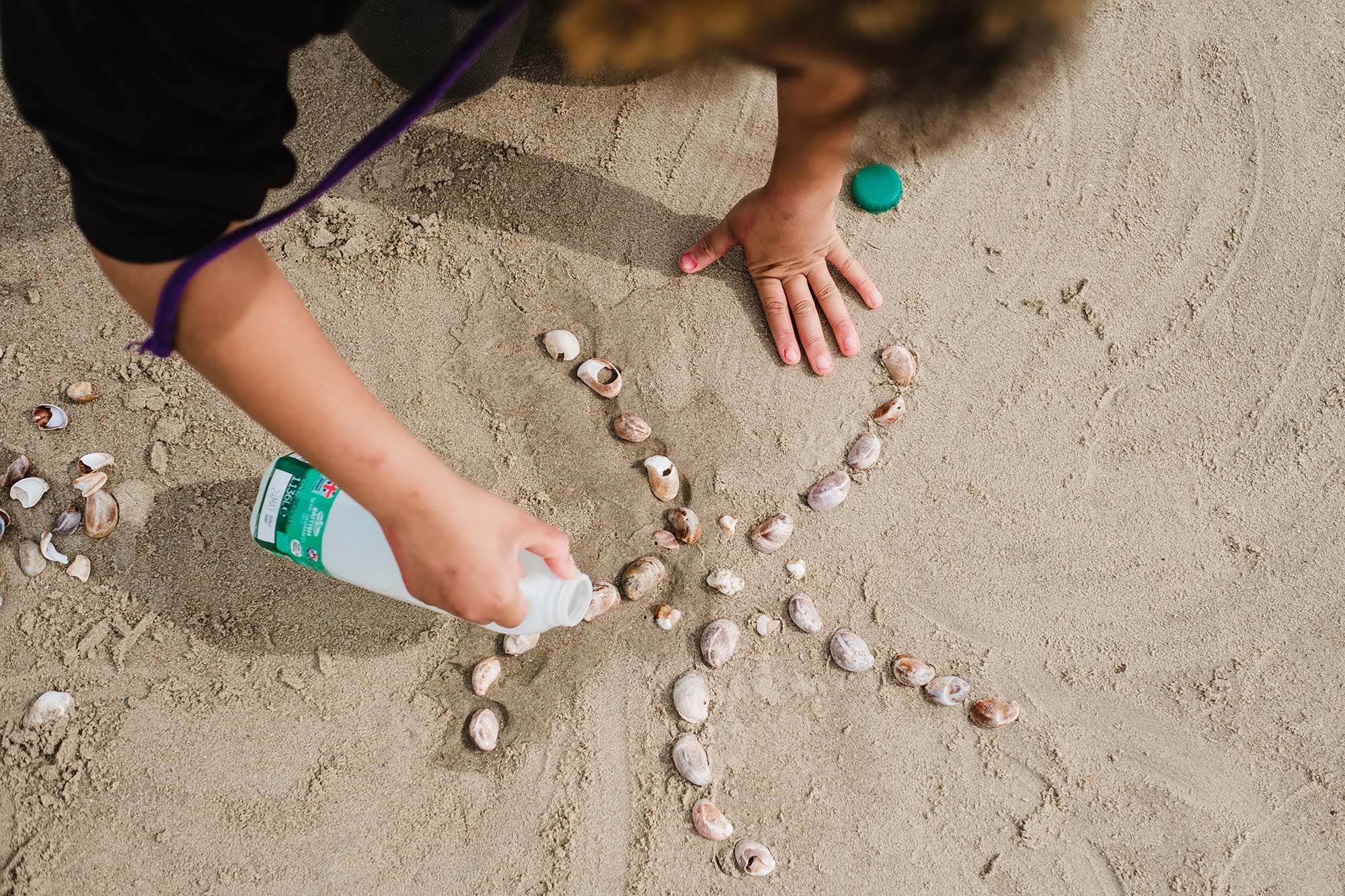 making art at the beach