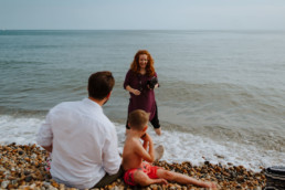 Anja shooting family on the beach in sussex