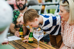 14 kids drinking with straws