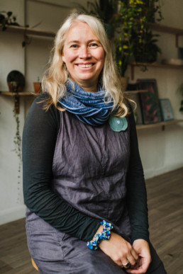 mini session portrait of a woman with plants