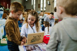 girl being a doctor at role play for children