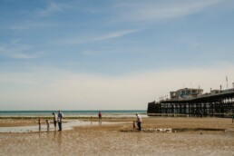 outdoor locations for family photos in Worthing low tide pier